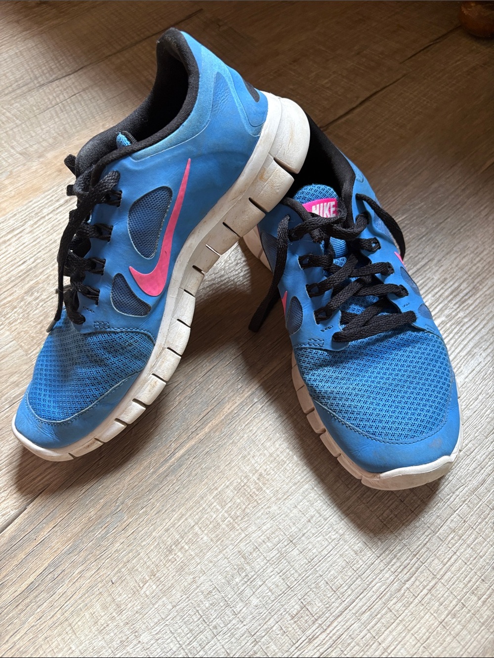 Nike Woman’s  Blue Sneakers with Pink Swoosh